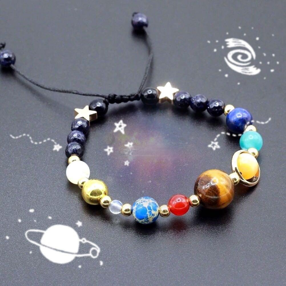 Bracelet porte-bonheur planètes et étoiles