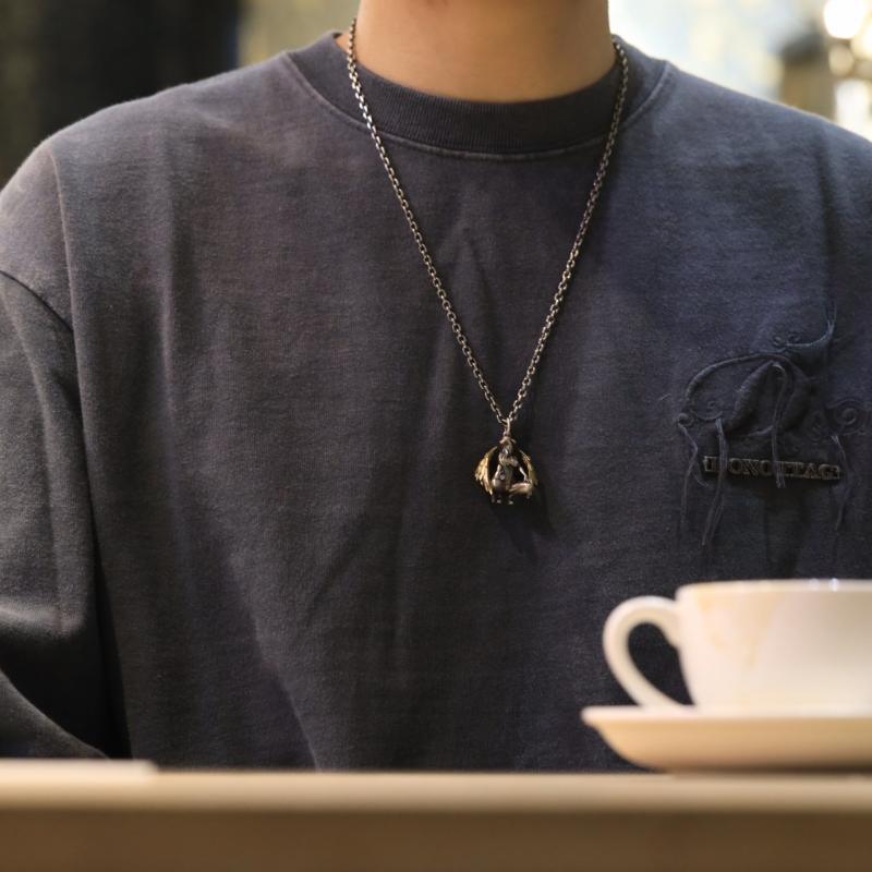 Pendentif diable et ange porte-bonheur