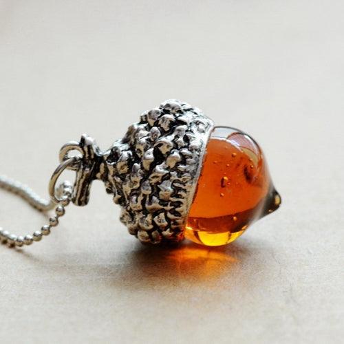 Pendentif porte-bonheur symbole gland