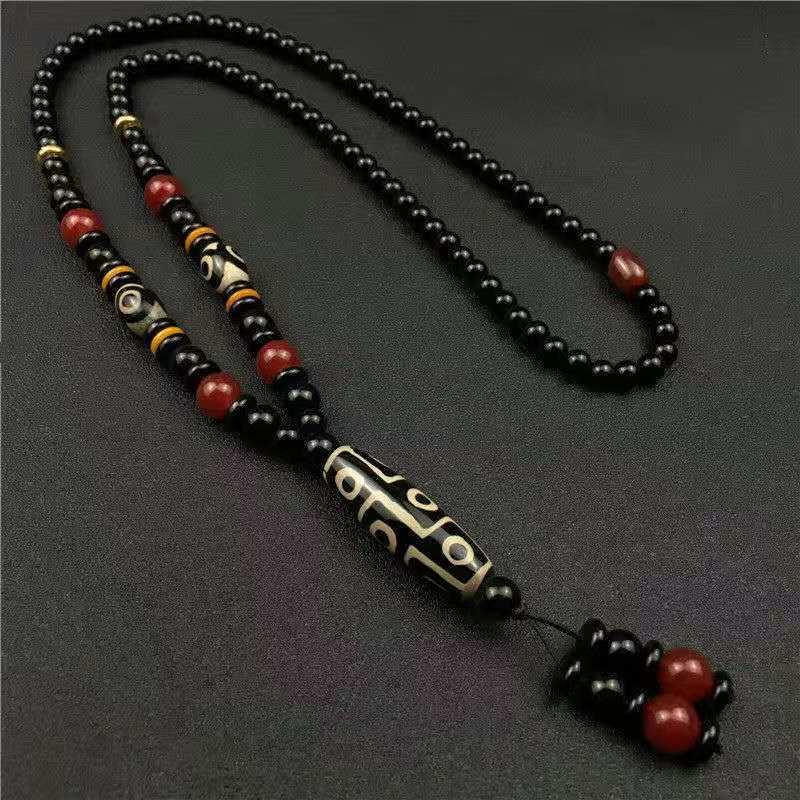 Pendentif porte-bonheur bouddha tibétain