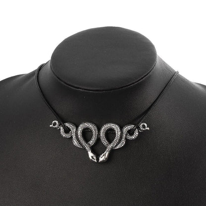 Pendentif serpent porte-bonheur