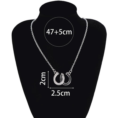 Pendentif amulette porte-bonheur fer à cheval